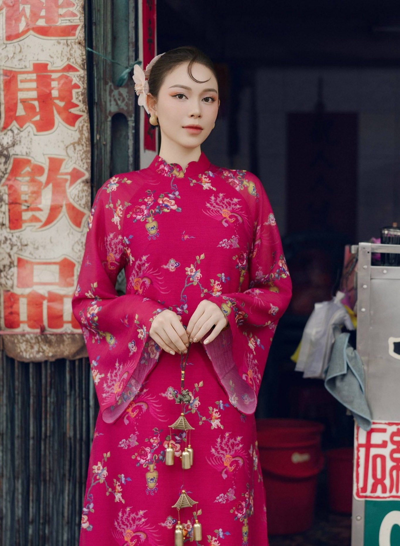 "Giang Chi Ao dai in magenta silk with floral print, traditional Vietnamese dress by Lalin."