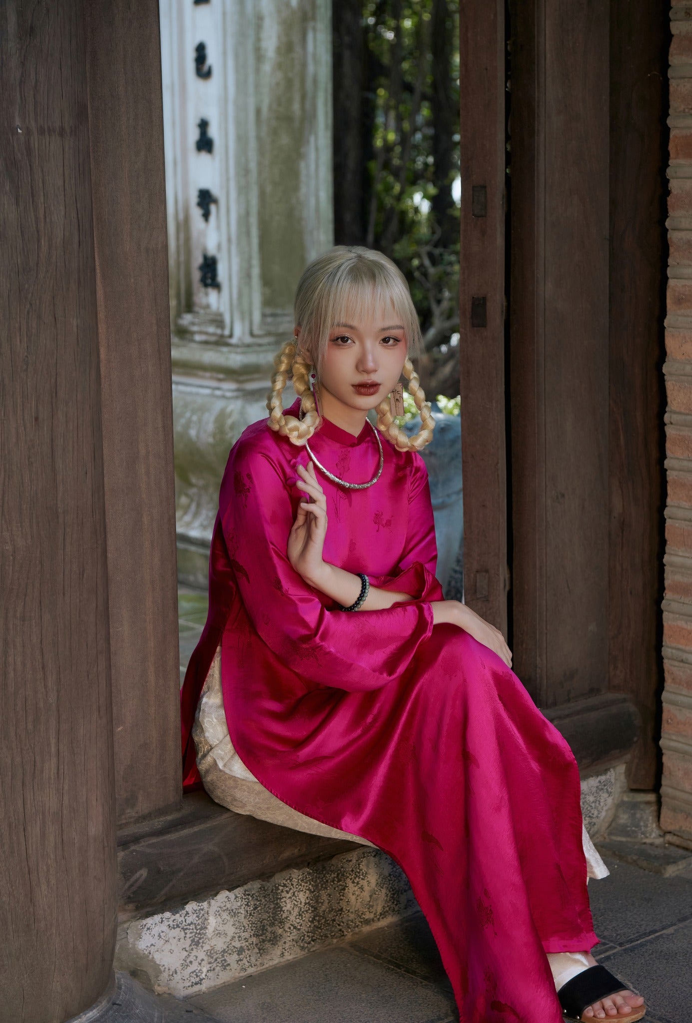 "Magenta silk Lien Hoa Ao Dai set, traditional Vietnamese dress by Moc, artisan-crafted."