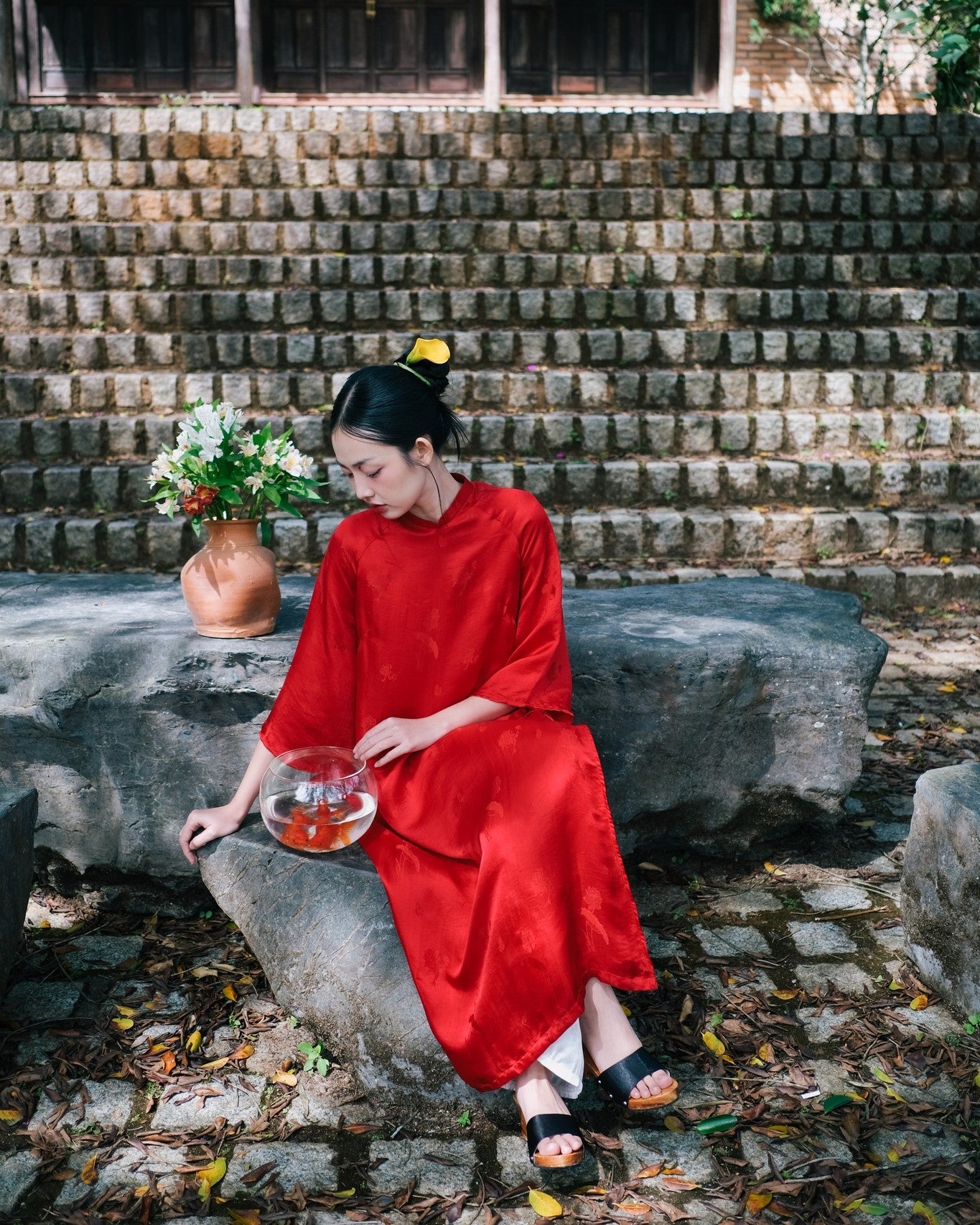 "Traditional Vietnamese Ao dai in red silkworm silk by Moc, modern pattern, cultural authenticity"