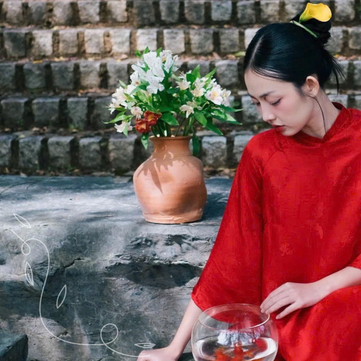 "Red silk 'Lien Hoa' Ao Dai set by Moc, traditional Vietnamese dress with modern design."