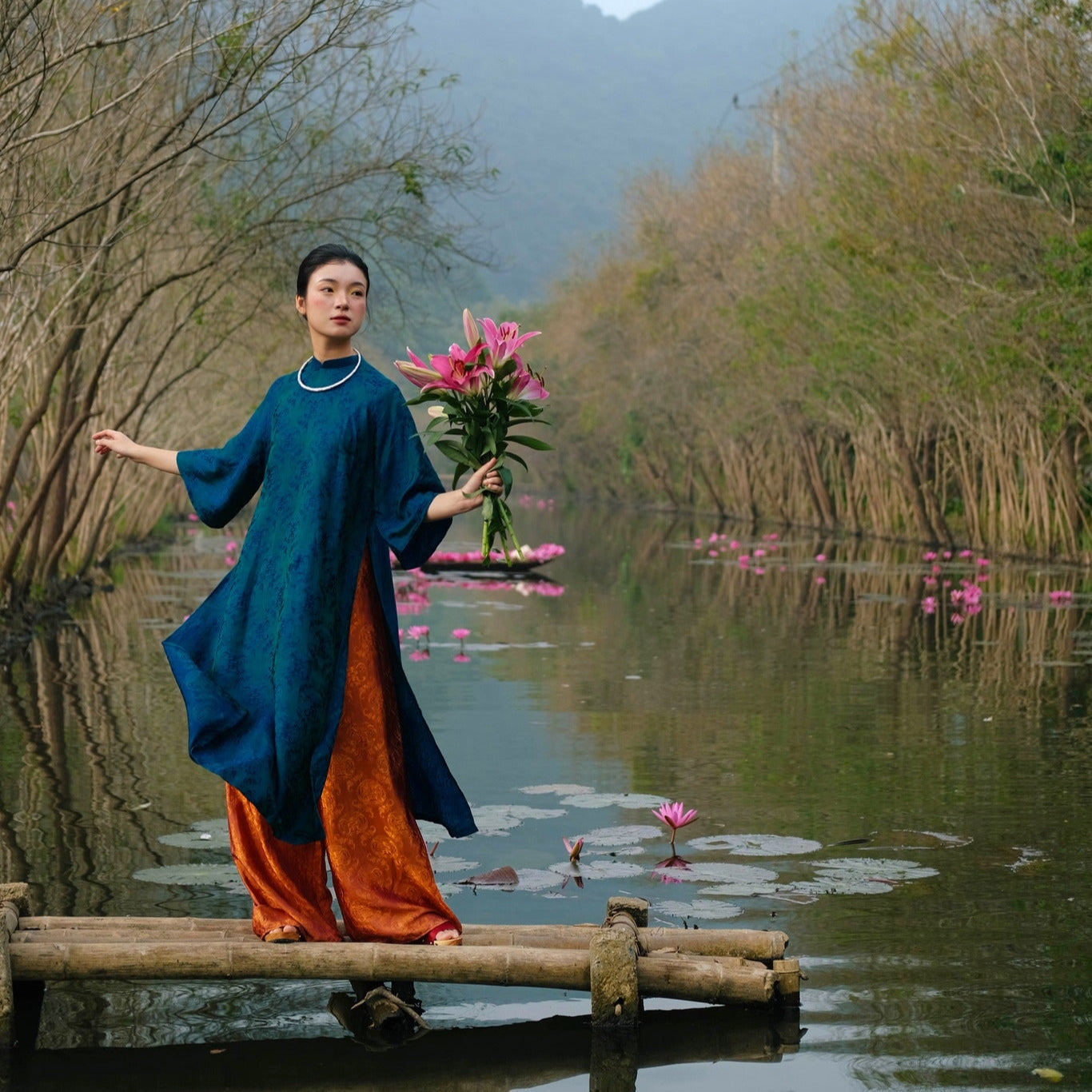 "Loc Tho Ao Dai set in red silk and jacquard, traditional Vietnamese dress with modern cut, artisan design."