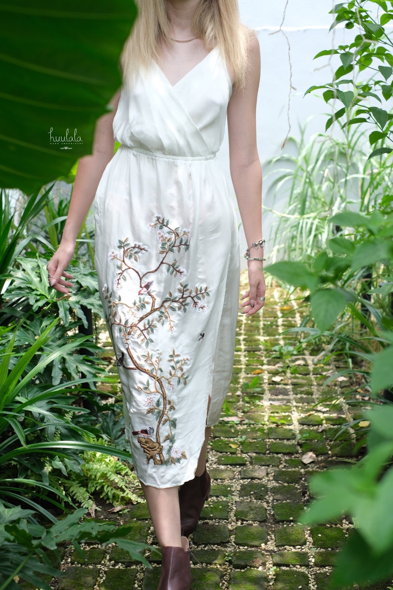 "Morning Dew" embroidered V-neck silk dress by Huulala, featuring red floral patterns, artisan-crafted with Vietnamese cultural authenticity.