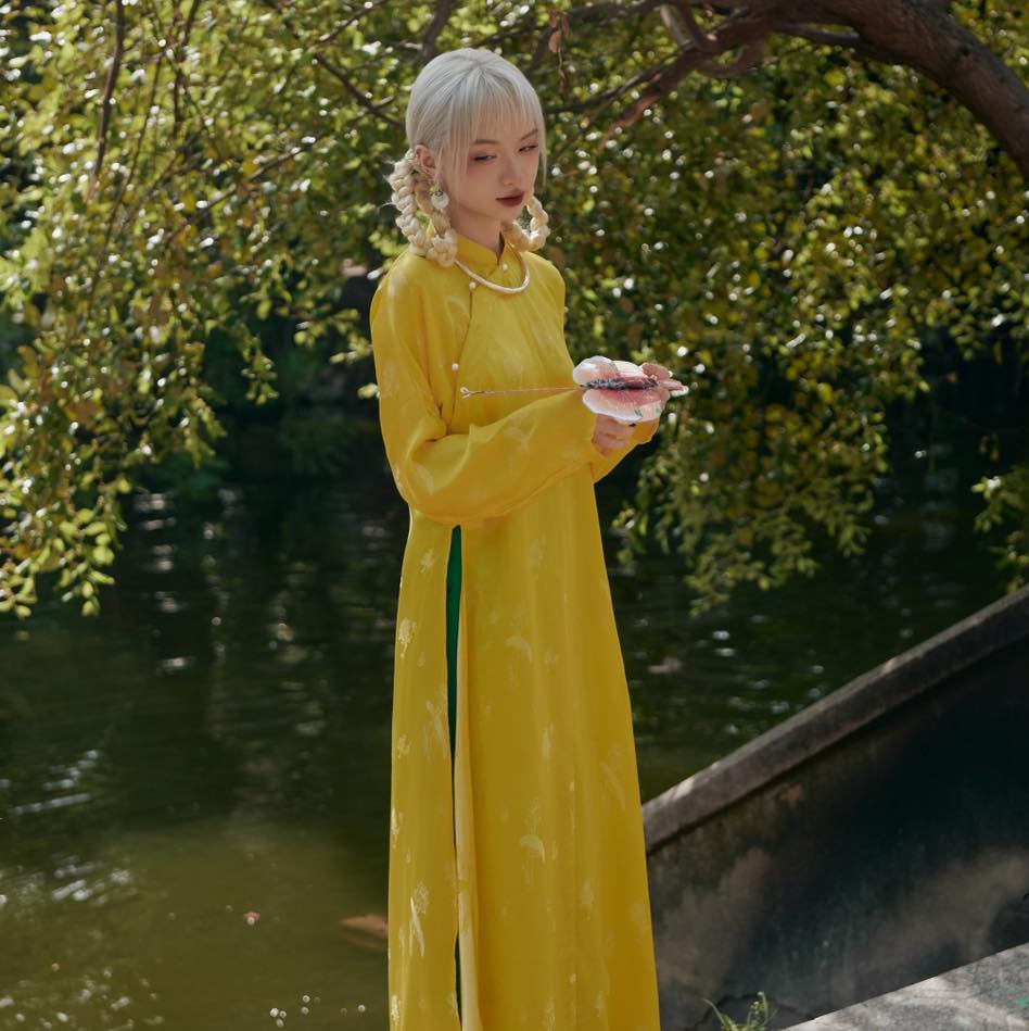 Vietnamese Ao Dai - Ngu Than Ao Dai set - Silkworm Silk in Yellow [Traditional cut] - front view in yellow by Moc