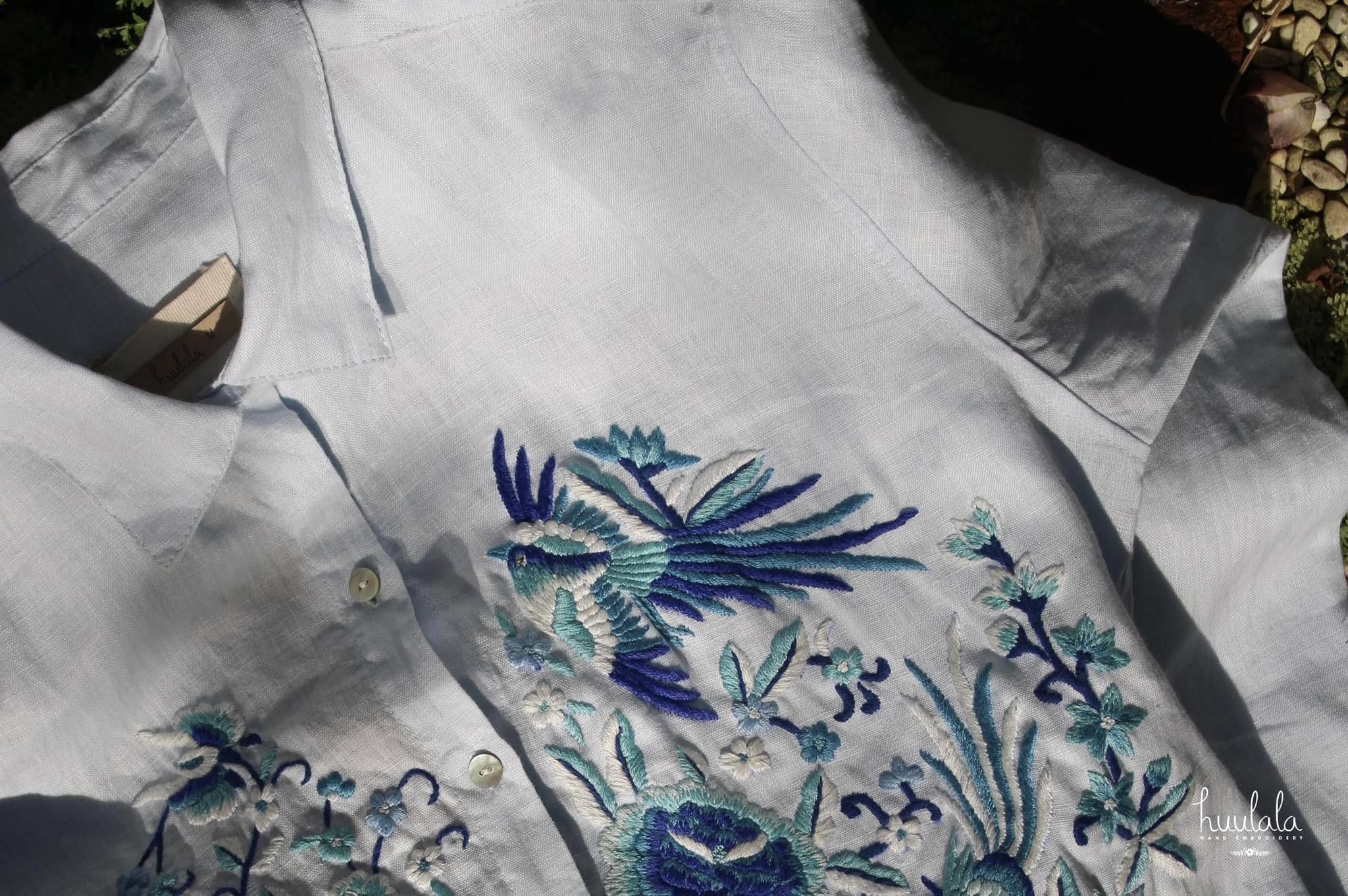 "Zoya embroidered linen shirt in light blue with blue floral embroidery, Vietnamese-inspired design by Huulala."