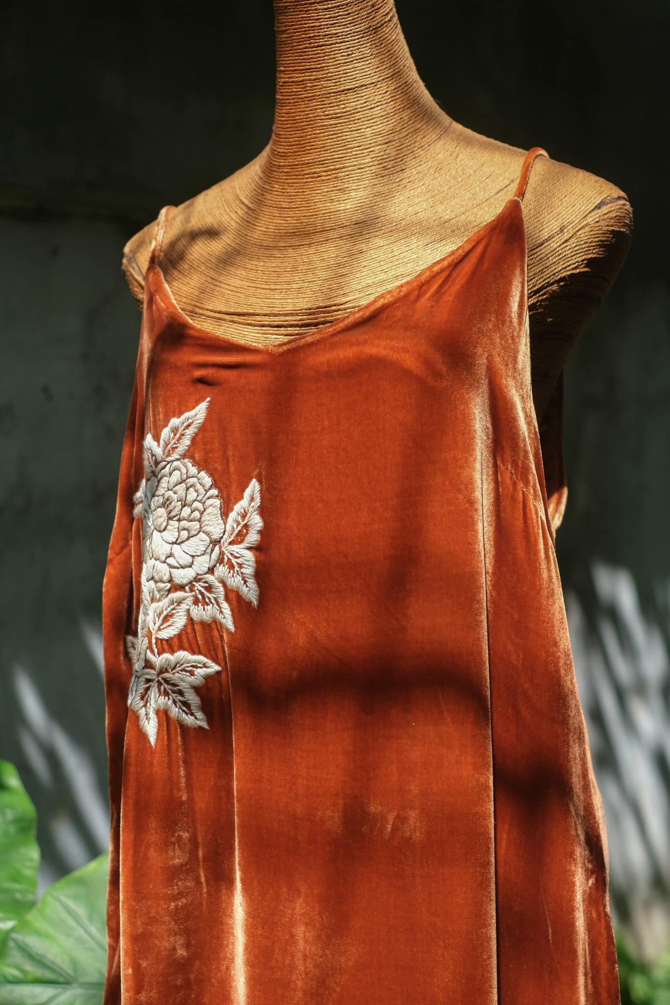 "Rumi" embroidered suede tank-top dress in orange with white floral pattern by Huulala.