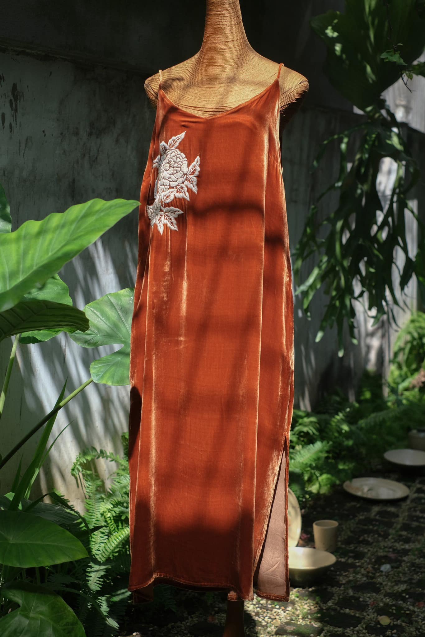 "Rumi embroidered suede tank-top dress in orange by Huulala, featuring white floral embroidery, ethnic-inspired design."