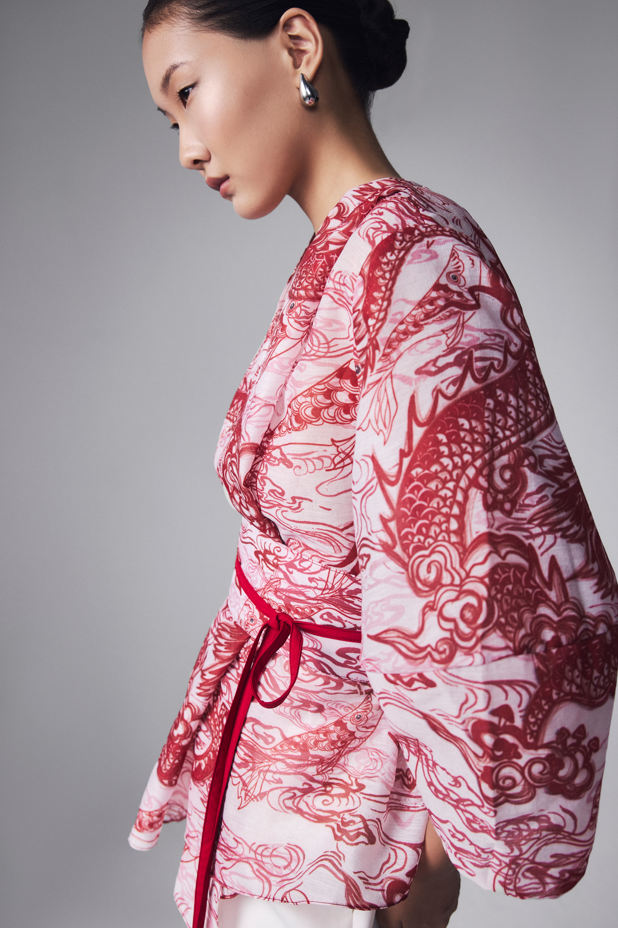 "Vĩ Kimono Top - Silk Organza in Black with Red Traditional Patterns by Keira Tong"