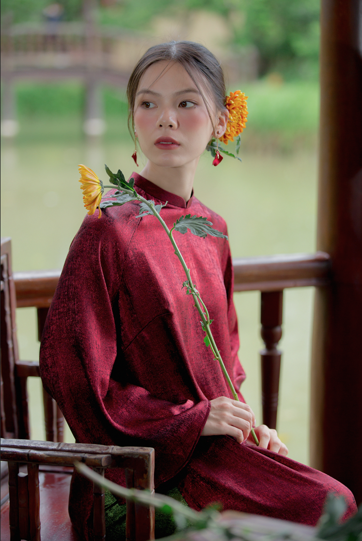 Tich Luu" Ao Dai Set in Metallic Pomegranate Red with Dark Moss Pants - Detail shot - Handcrafted design