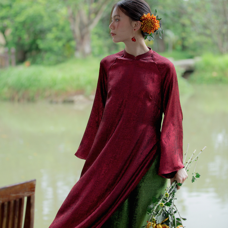 Tich Luu" Ao Dai Set in Metallic Pomegranate Red with Dark Moss Pants - Style shot - Luxury Vietnamese apparel
