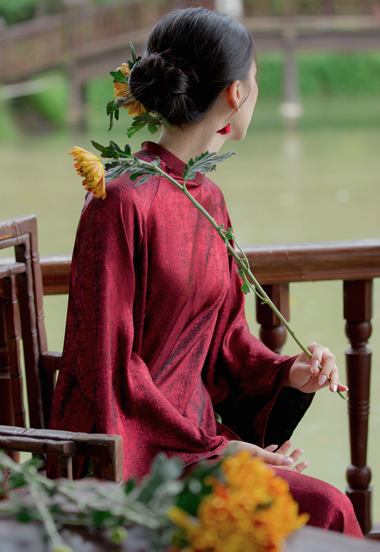 Tich Luu" Ao Dai Set in Metallic Pomegranate Red with Dark Moss Pants - Side view - Traditional craftsmanship