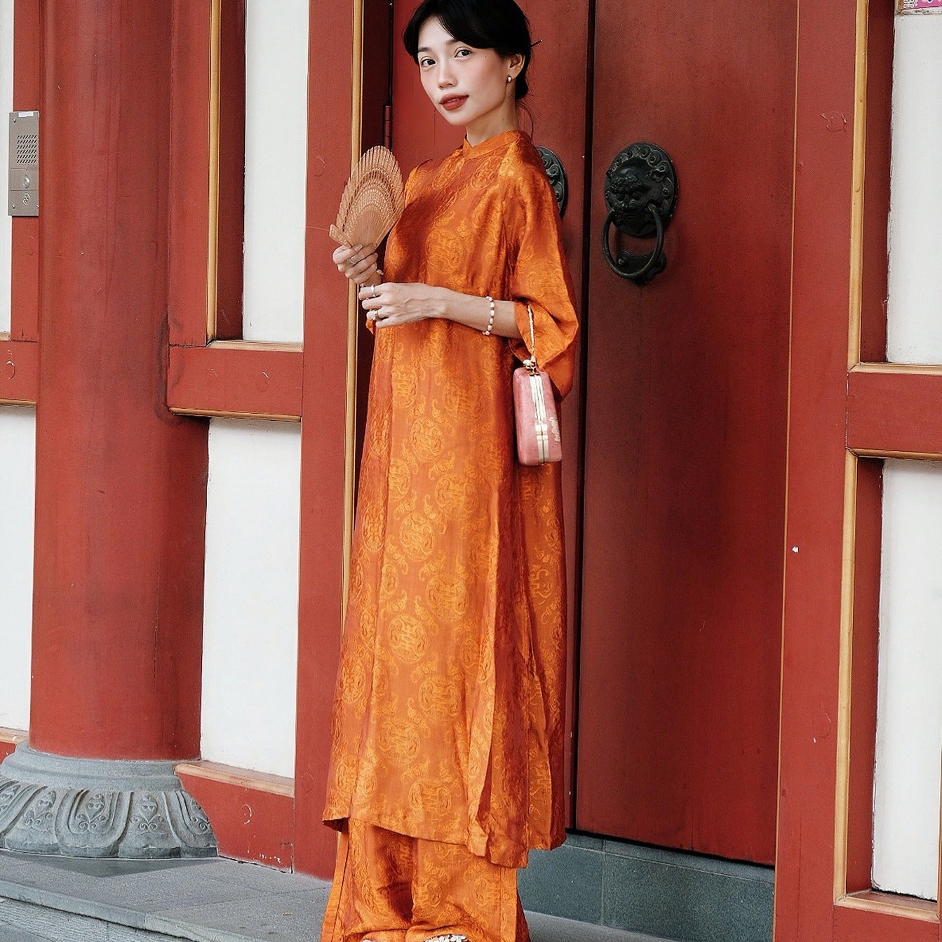 Vietnamese Ao Dai - Tho Doi Ao Dai set - Wormsilk in Orange [Modern cut] - front view in brocade in orange by Moc