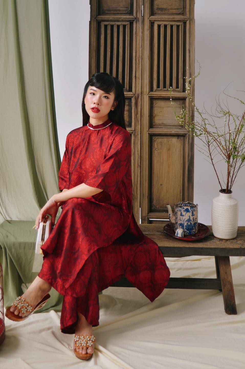 "Loc Tho Ao Dai set in crimson wormsilk, traditional Vietnamese dress by Moc"