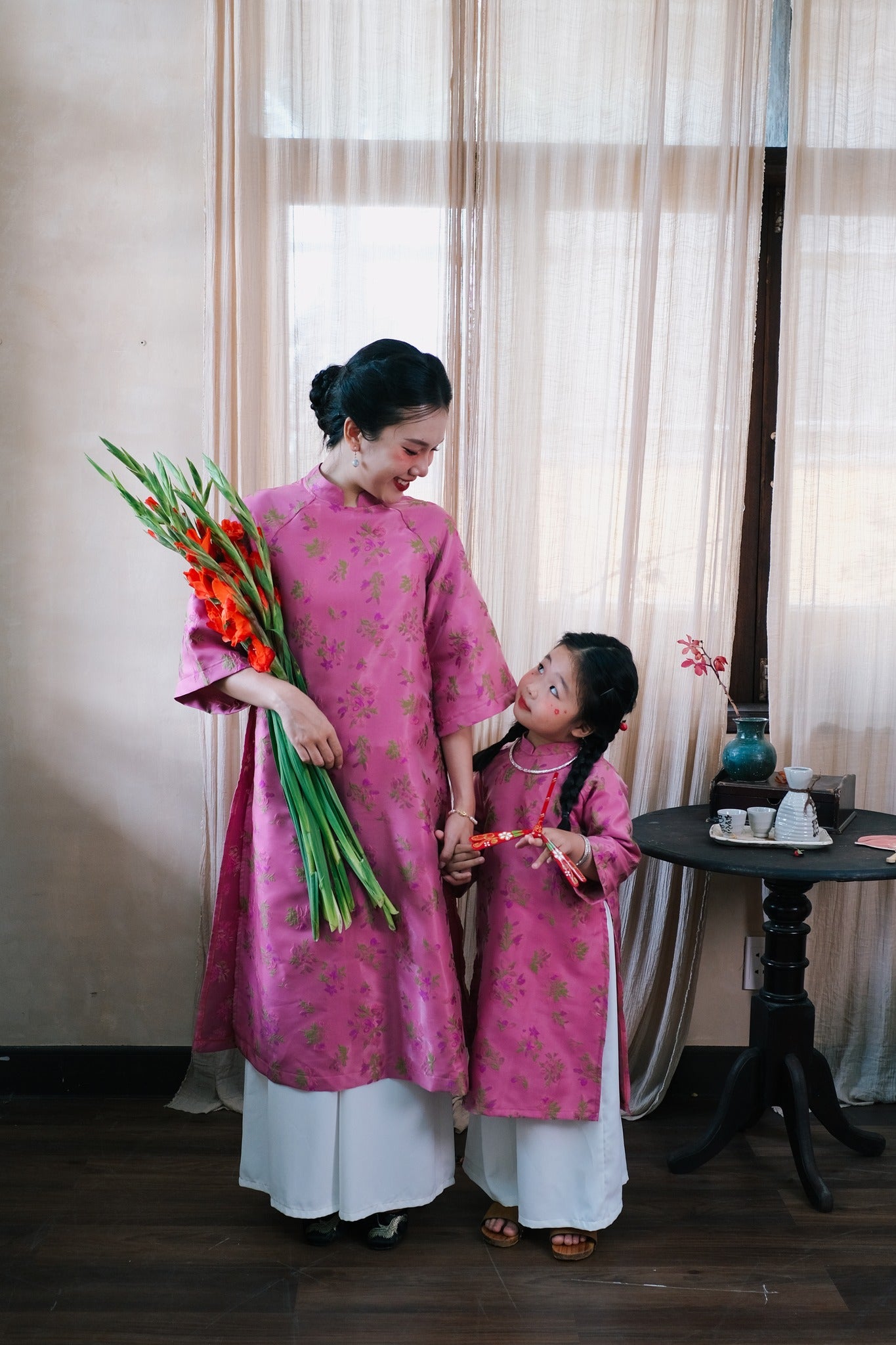 "Tu Dinh Huong Ao Dai set in pink silk with jacquard floral pattern, traditional Vietnamese dress by Moc."