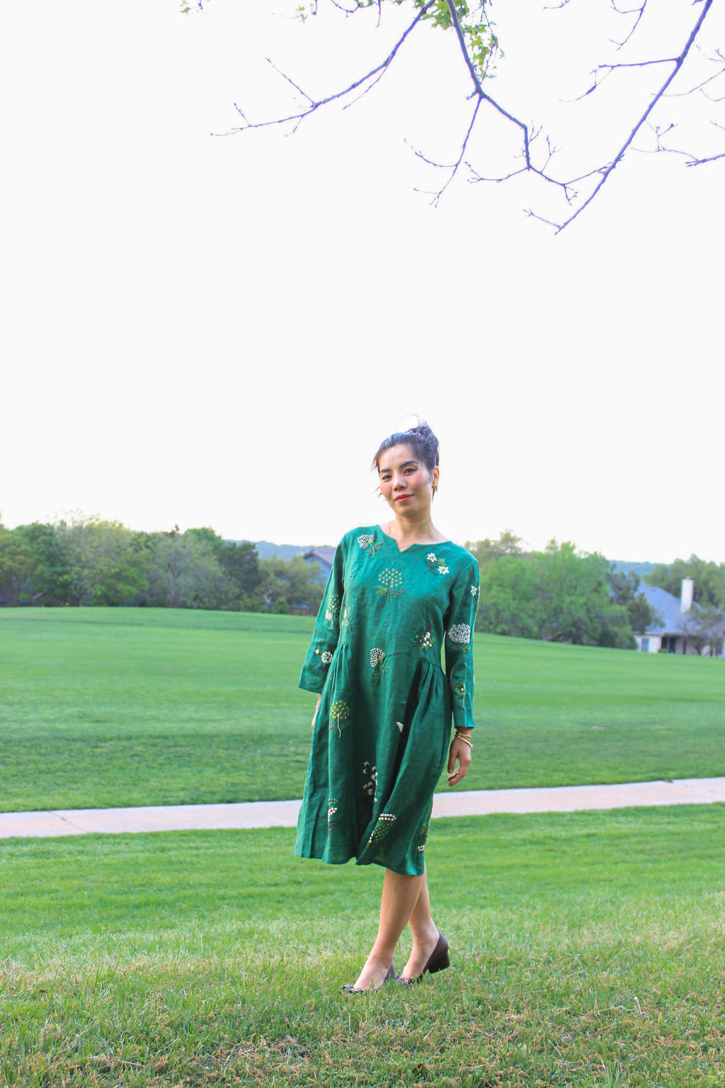"Green embroidered linen dress 'Mimosa' by Huulala, featuring floral patterns, Vietnamese cultural style"