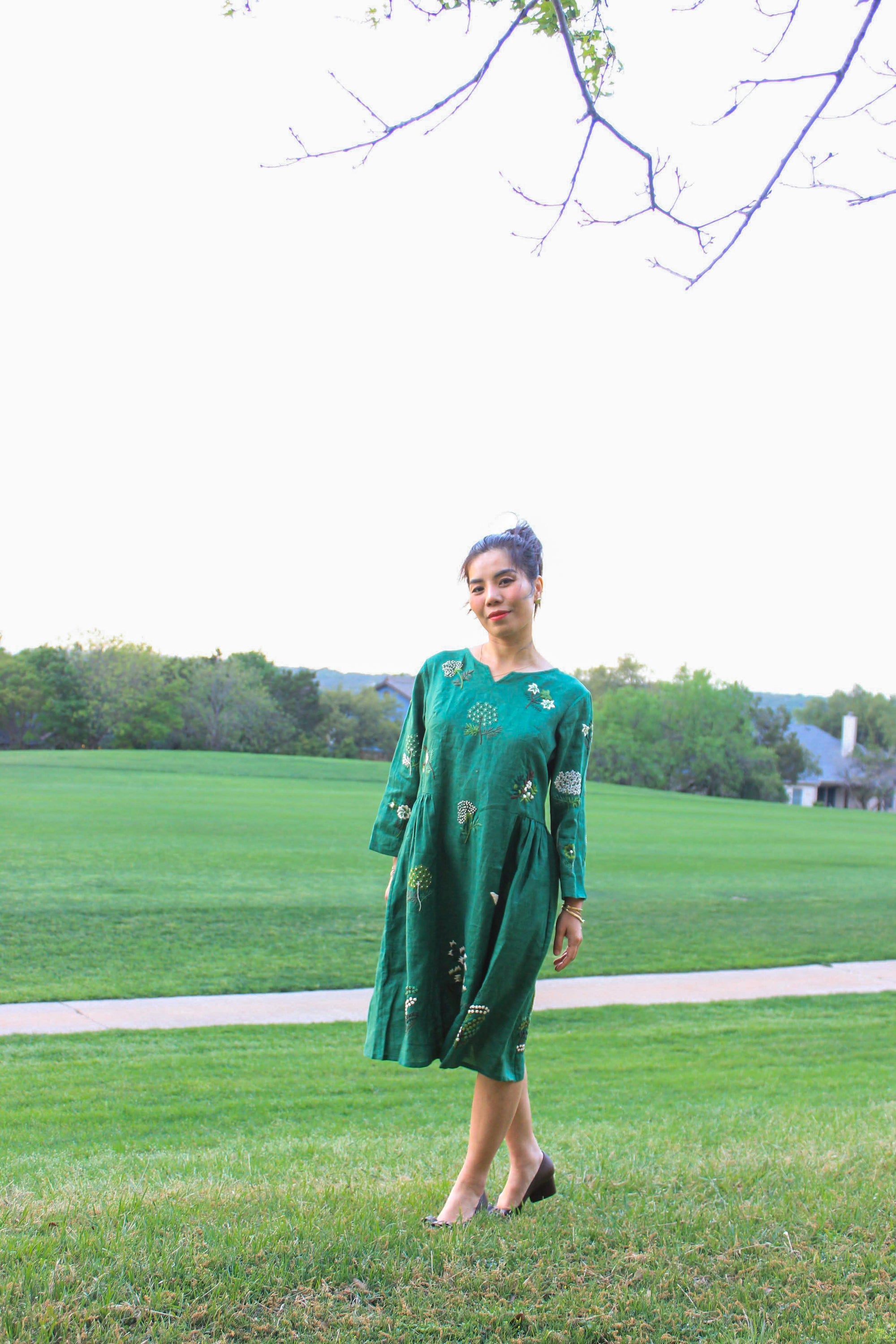 "Green embroidered linen dress 'Mimosa' by Huulala, featuring floral patterns, Vietnamese cultural style"