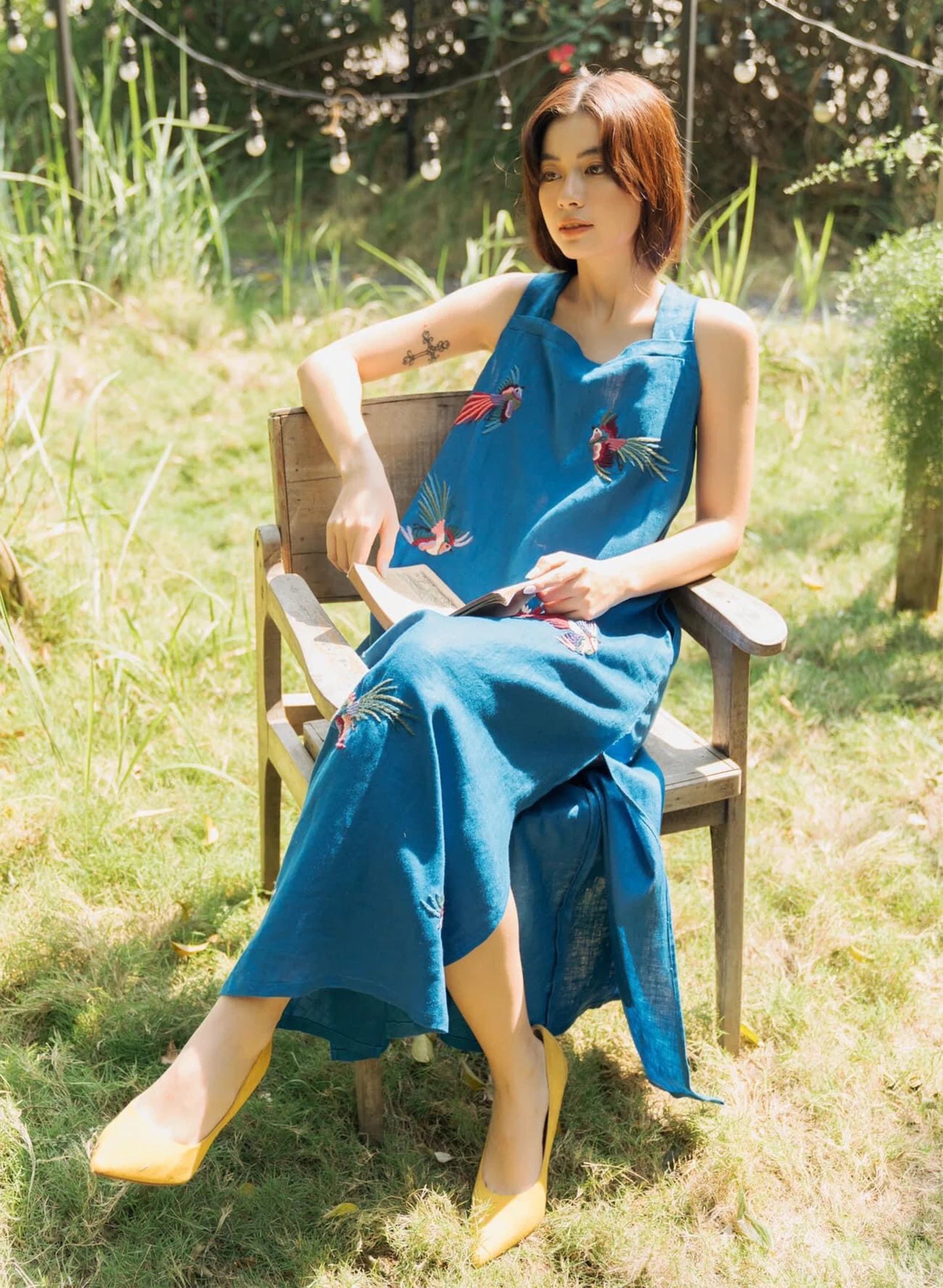 “Indigo” Embroidered Linen Dress in Blue by Huulala - back view showing intricate embroidered details and premium linen, premium Vietnamese embroidered linen clothing