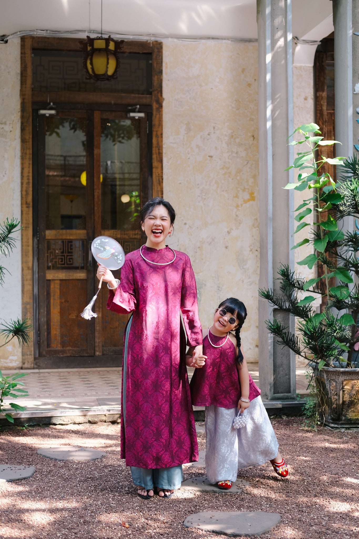 "Loc Tho Ao Dai set in dark magenta wormsilk, traditional Vietnamese dress by Moc."