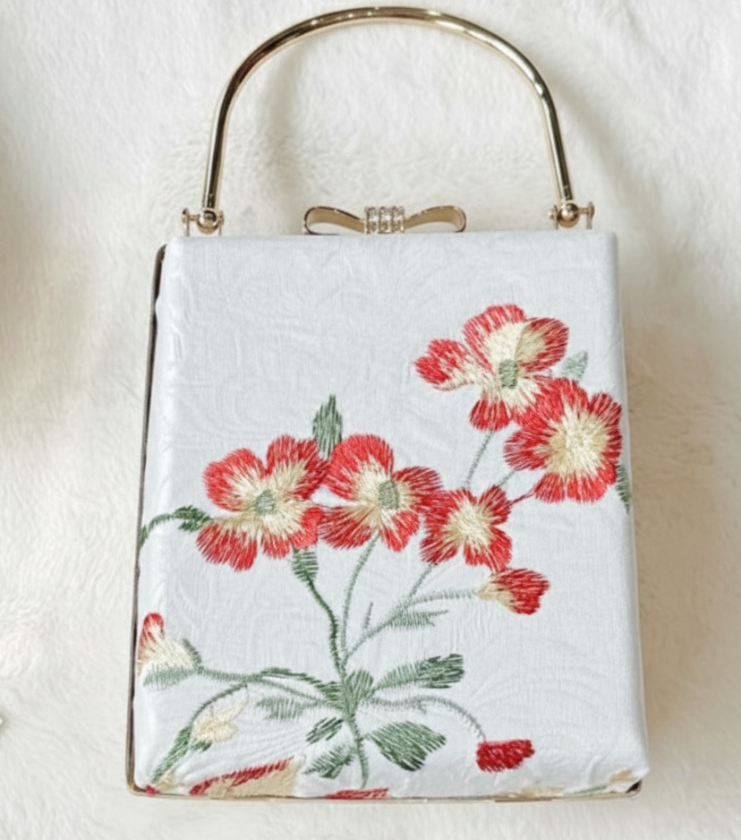 Tue Lan — Embroidered Viscose Handbag with Metal Handle in Rectangle shape - flat lay display by Tam
