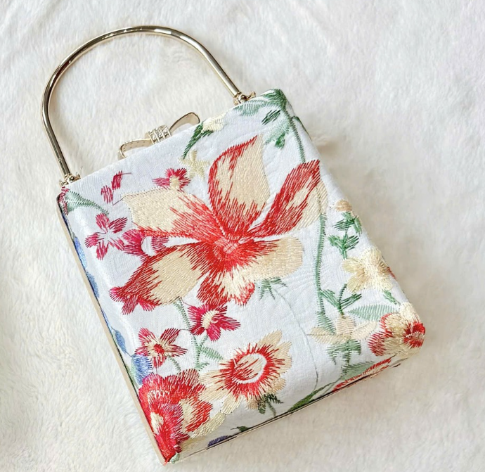 Tue Lan — Embroidered Viscose Handbag with Metal Handle in Rectangle shape - flat lay display by Tam