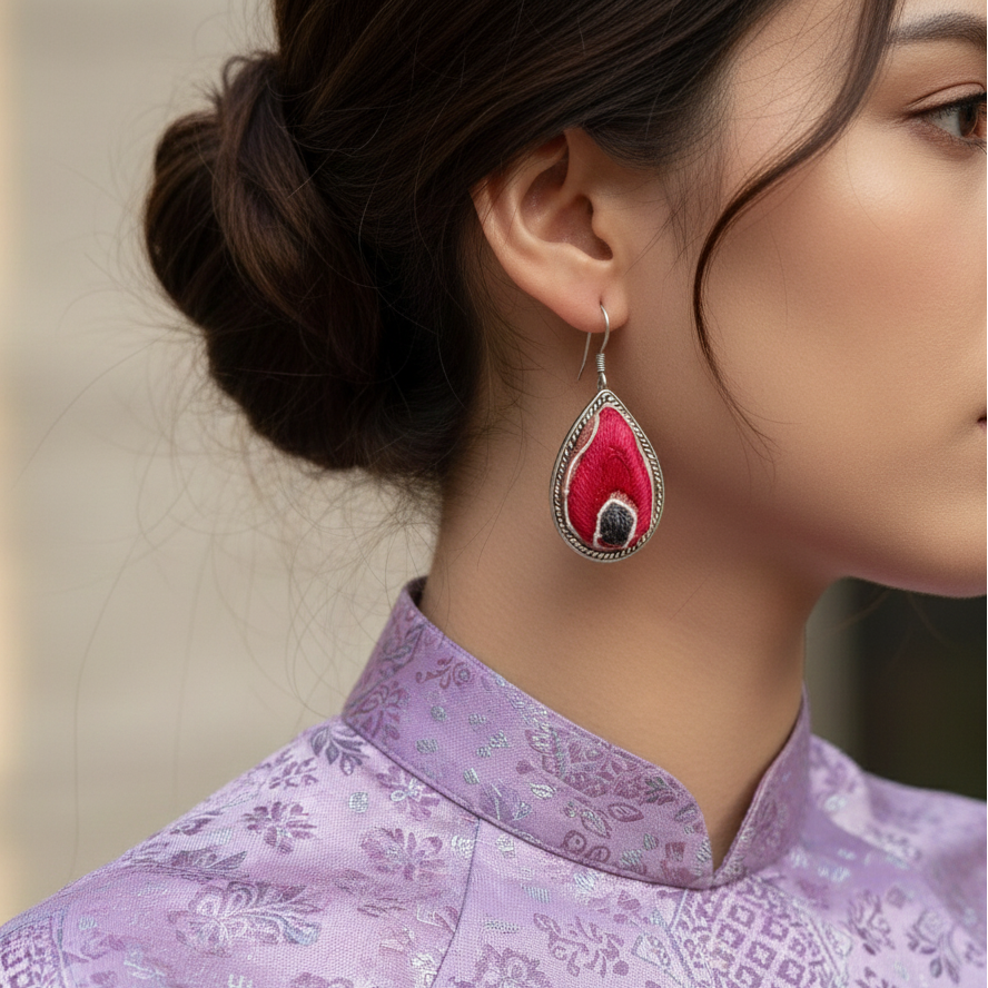 Peacock Dream Vietnamese artisan earrings showing peacock motif detail