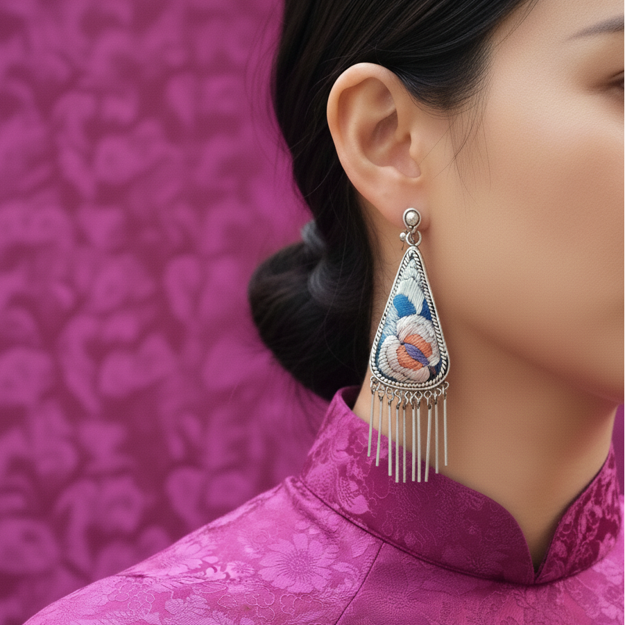 Cloud Blossom Vietnamese embroidery earrings lifestyle shot showing teardrop shape