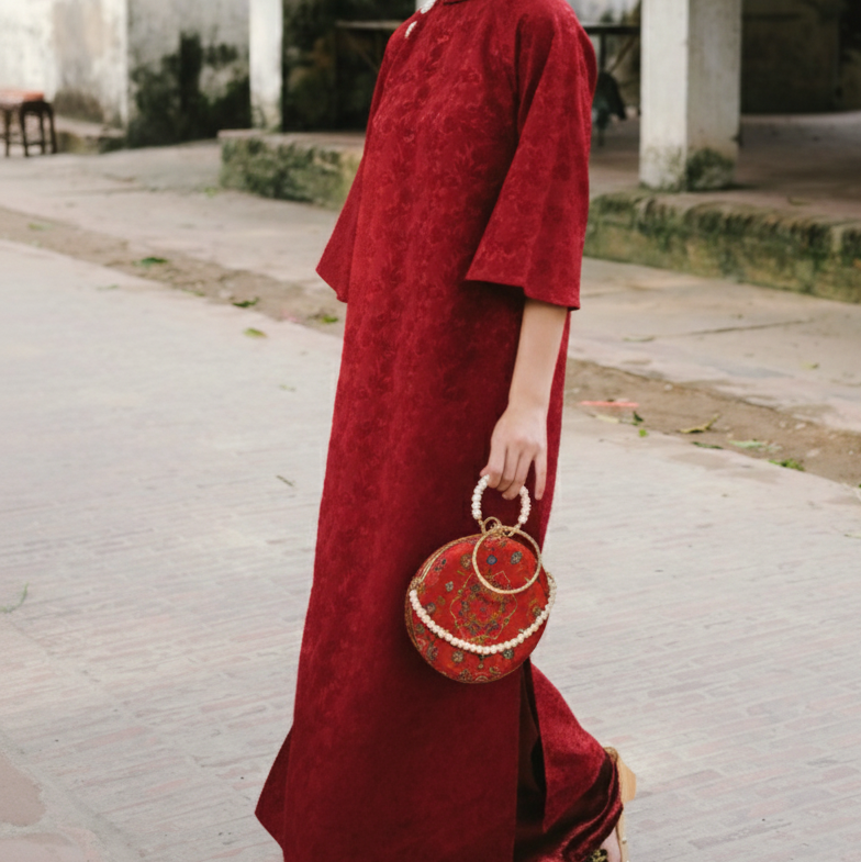 Vietnamese Ao Dai - “Nguyệt Tú” – Silk Brocade Round Clutch with Metal Handle - side profile in velvet in red by Moc - Bags